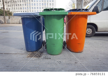 3 Recycling Bins in the street 3 Recycling Bins in the street 76859131