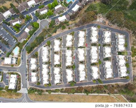Aerial view of middle class townhouse and residential condos in San Diego 76867433