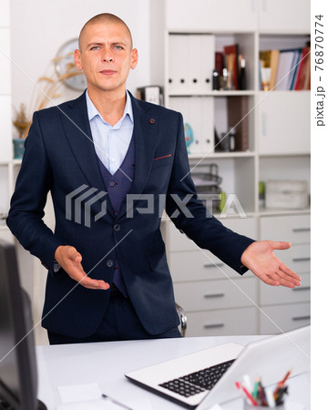 Working man satisfied with agreement in office Working man satisfied with agreement in office 76870774