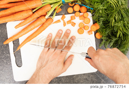 Cutting fingers with a knife Cutting fingers with a knife 76872754
