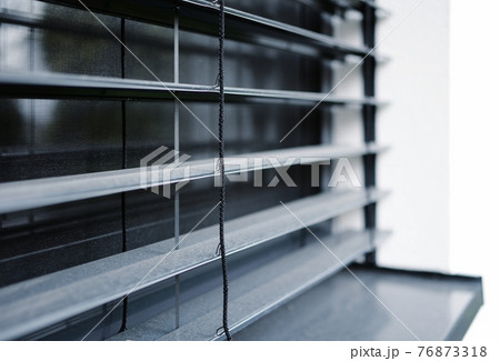 A closeup of external venetian blinds 76873318