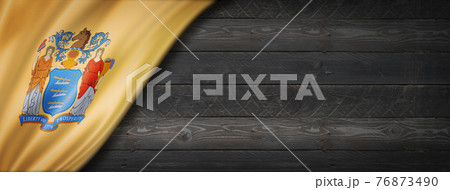 New Jersey flag on black wood wall banner, USA 76873490