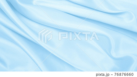 Smooth elegant blue silk or satin luxury cloth texture as abstract background. Luxurious background design Smooth elegant blue silk or satin luxury cloth texture as abstract background. Luxurious background design 76876660