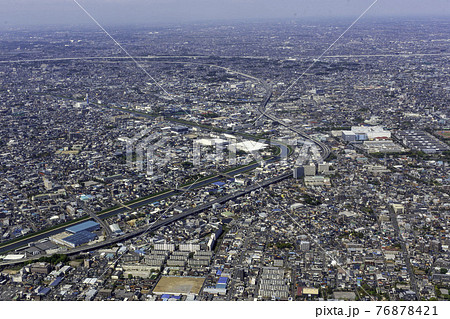 東京都足立区加賀上空から埼玉県草加市方向を空撮 東京都足立区加賀上空から埼玉県草加市方向を空撮 76878421