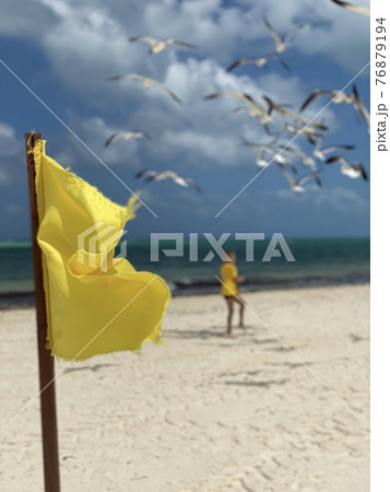 Yellow waving flag Yellow waving flag 76879194