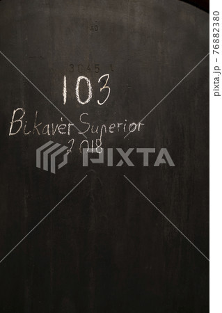 wine cellars with barrels, traditional wine called Bikaver near Eger, Hungary wine cellars with barrels, traditional wine called Bikaver near Eger, Hungary 76882380