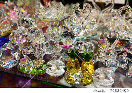 Bohemian glass figurines in showcase 76886400