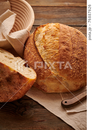 Homemade tartine bread on wooden table 76887626