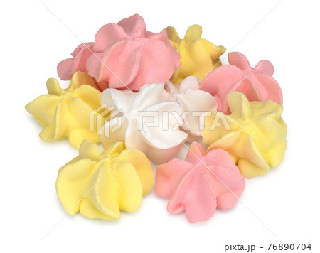 Meringue of different colors isolated on white 76890704