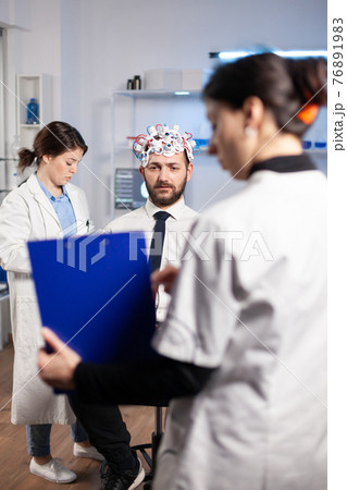 Researcher neurologist doctor asking man's illness symptoms Researcher neurologist doctor asking man's illness symptoms 76891983