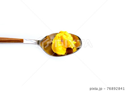 Margarine cheese butter in spoon on white Margarine cheese butter in spoon on white 76892841