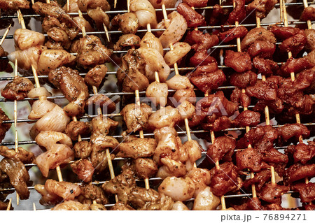 seasoned meat skewer on a wooden skewer background culinary seasoned meat skewer on a wooden skewer background culinary 76894271