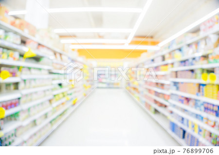 Blurred food and drink on shelf in super market with cart Blurred food and drink on shelf in super market with cart 76899706