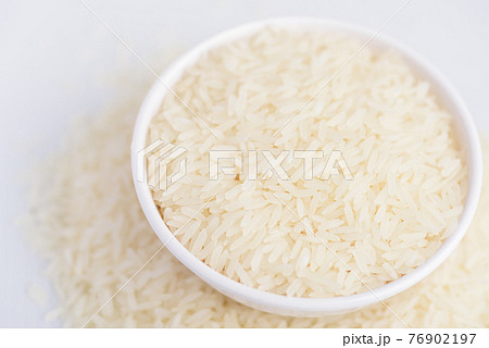 Organic Thai Jasmine rice grain in a bowl prepare for cooking 76902197