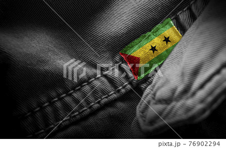 Tag on dark clothing in the form of the flag of the Sao Tome and Principe Tag on dark clothing in the form of the flag of the Sao Tome and Principe 76902294