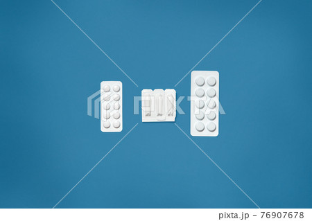 Various medicines, vitamins, pills blisters. Drug medication, supplements collection. Studio photography of three packages of tablets. Mock up for special offers or advertisment. Health care concept. Various medicines, vitamins, pills blisters. Drug medication, supplements collection. Studio photography of three packages of tablets. Mock up for special offers or advertisment. Health care concept. 76907678