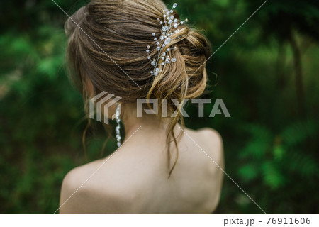 women hairstyle for long hair careless bun with decoration, jewelry women hairstyle for long hair careless bun with decoration, jewelry 76911606