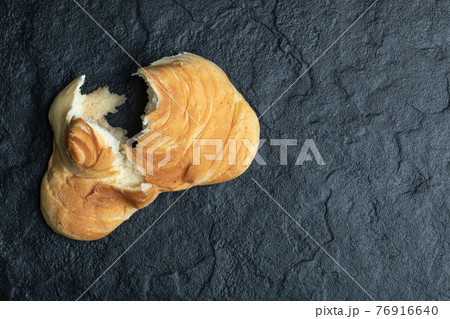 Delicious fresh pastry on a dark background 76916640