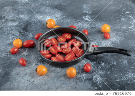 Fresh half cut or whole cherry tomatoes 76916976