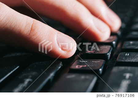 close up. man typing text to the laptop. 76917106