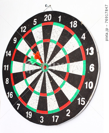 side view.Arrow dart hitting the center of the target dart Board 76917847