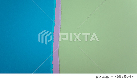 Blue, purple, and green color torn papers abstract texture background. Blank matte papers combination. Free space. Top view, horizontal style. 76920047