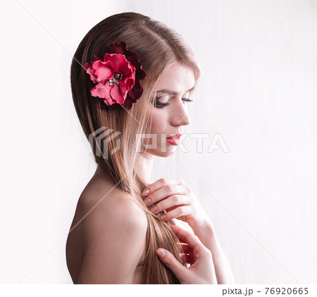 portrait of cute girl with long hair .isolated on light portrait of cute girl with long hair .isolated on light 76920665