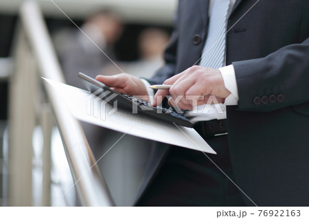 close up.businessman using calculator in office. accounting close up.businessman using calculator in office. accounting 76922163