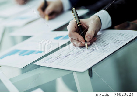 hands business team that works with financial schemes hands business team that works with financial schemes 76923024