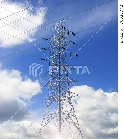power poles pole with wires against a blue sky 76925342