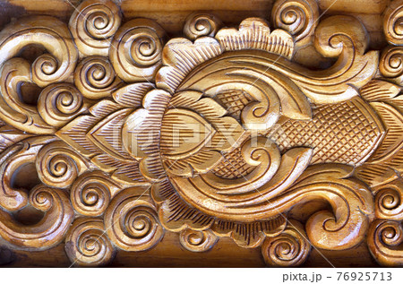 Carved wood background Carved wood background 76925713