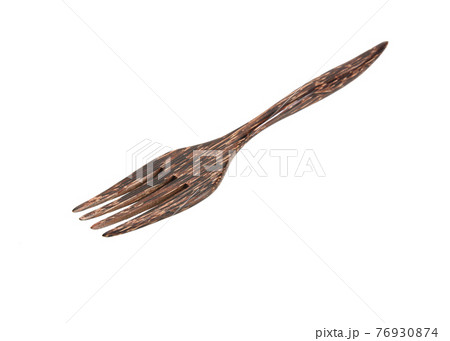 Wooden fork on white background 76930874