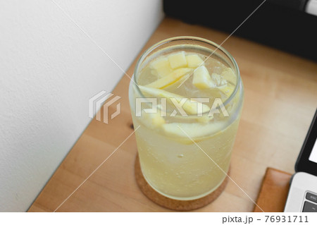 Relax summer day with Lemon Soda and working on the laptop. Work from home. Relax summer day with Lemon Soda and working on the laptop. Work from home. 76931711