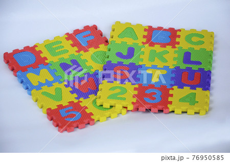 Rubber mat with colorful alphabet design isolated on white background.   76950585
