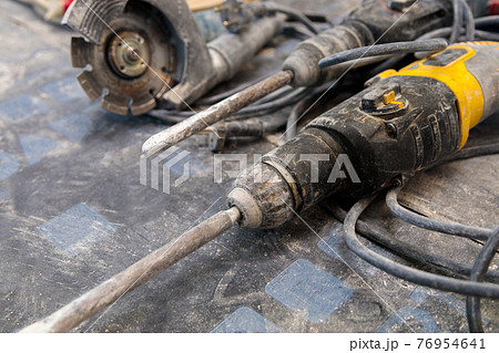 A set of tools for apartment renovation. Rotary hammer, drill, circular saw 76954641