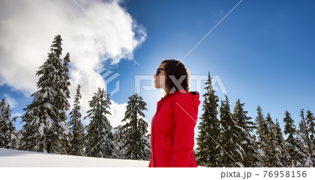 Adventure Woman Hiking on top of Canadian Mountains Adventure Woman Hiking on top of Canadian Mountains 76958156