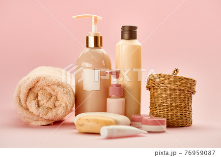 Skin care products on pink background, nobody Skin care products on pink background, nobody 76959087