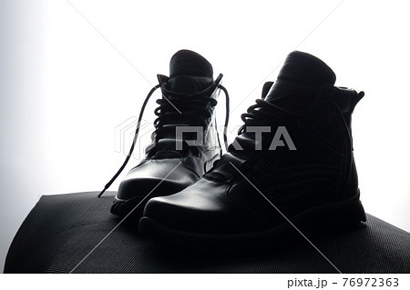 A pair of high black leather handmade ankle boots for man. Art vision. 76972363