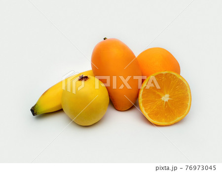 fresh mix of fruits mango, guava, orange, banana.yellow tropical fruits 76973045