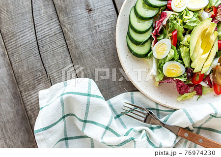 Healthy eating concept flat lay. Mediterranean diet, food on wooden background 76974230