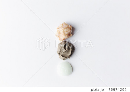 Textures from cosmetics. Different body scrubs. Smears on the table Textures from cosmetics. Different body scrubs. Smears on the table 76974292