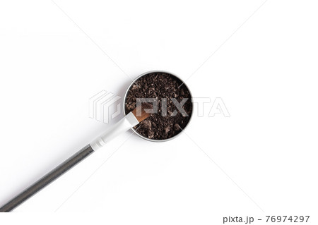 Dark brown face shadow in container and eye shadow or make-up brush 76974297