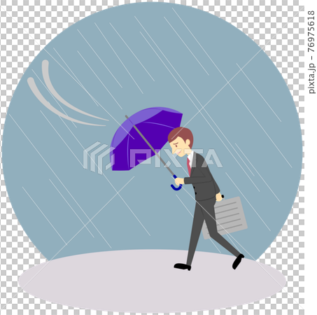 風に飛ばされそうなオフィスワーカー（男性） 76975618