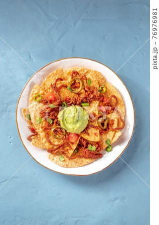 Nachos, Mexican tortilla chips, shot from above 76976981