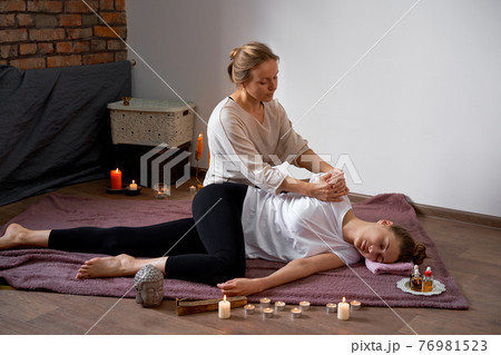 Relax and enjoy in spa salon, getting thai massage by professional masseur. Relax and enjoy in spa salon, getting thai massage by professional masseur. 76981523