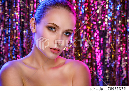 Magic Girl Portrait in Gold. Golden Makeup, close-up portrait in Magic Girl Portrait in Gold. Golden Makeup, close-up portrait in 76985376