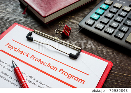 Paycheck Protection Program PPP loan application form and pen. 76986848