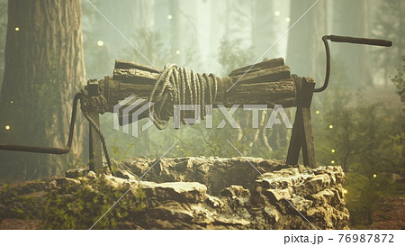 old stone draw well in the forest with fog old stone draw well in the forest with fog 76987872