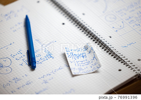 Math handwriting in notebook closeup Math handwriting in notebook closeup 76991396