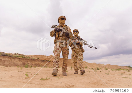 Two special forces rangers during the military operation 76992169